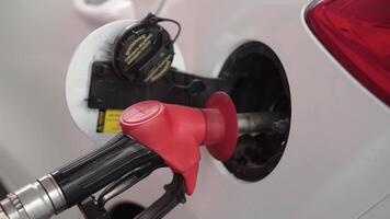 Gas Station Worker Refilling Car at Service Station. Clip. Gas pump for refueling car on gas station video