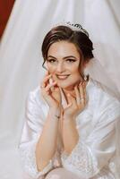 Beautiful bride, attractive woman in wedding dress, fashionable hairstyle and makeup. Happy bride woman. Smiling bride. Wedding day. A gorgeous bride. Marriage. photo