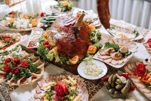 Cossack table. Banquet hall Meat treats for guests. Homemade cutouts. Pork tenderloin. Delicious meat cuts. Meat plate. Delicious compositions from smoked mint. Cottage cheese. photo