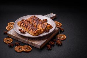 Delicious crispy sweet puff pastry with chocolate and salted caramel photo