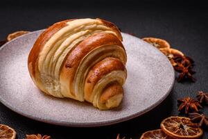 Delicious crispy sweet croissant cornet with chocolate photo