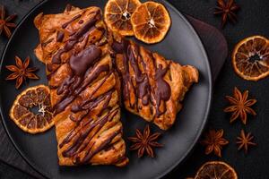 Delicious crispy sweet puff pastry with chocolate and salted caramel photo