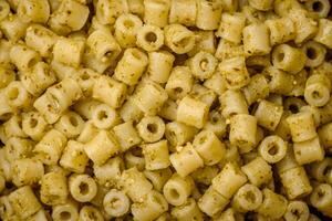 Delicious ditali pasta from durum wheat with salt and spices photo