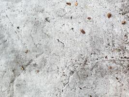 scratched concrete backdrop, giving your design a rustic and worn appearance photo