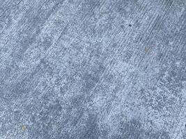 An antique concrete wall, weathered and worn, adding character to any project. photo