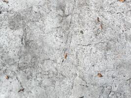 scratched concrete backdrop, giving your design a rustic and worn appearance photo