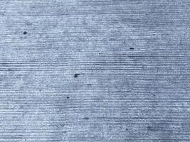 A retro wallpaper featuring a dark and scratched concrete texture.  copy space for design photo