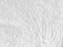 white fabric background, showcasing the exquisite texture of silk. copy space for design photo