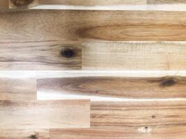close-up shot capturing the detailed grain of a pine wood board. photo