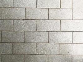 Dark and isolated concrete texture, offering a versatile and impactful design element. photo