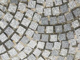 Rough and weathered concrete floor with a retro and vintage design. photo