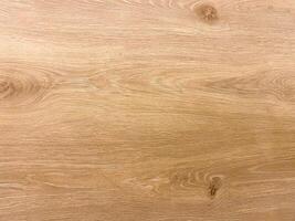 Plywood texture with a light, natural hue, creating a versatile backdrop for various designs. photo