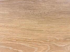 Plywood texture with a light, natural hue, creating a versatile backdrop for various designs. photo