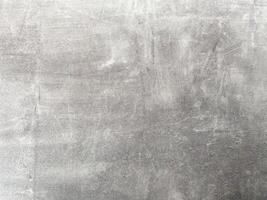 Grey and empty concrete wall, providing a neutral canvas for your creative endeavors. photo