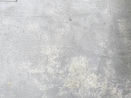 A blank and white-painted concrete texture, offering a versatile backdrop for any project. photo