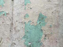 Grunge backdrop featuring an abstract paint pattern on concrete. photo