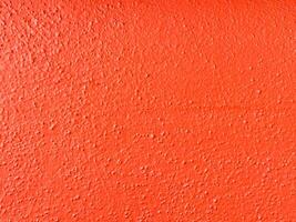 A beautiful red concrete background, combining simplicity and elegance in design. photo