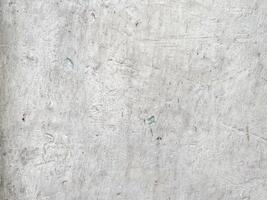 Grunge backdrop featuring an abstract paint pattern on concrete. photo