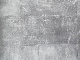 Grey and empty concrete wall, providing a neutral canvas for your creative endeavors. photo