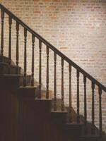 The play of light and shadow on the empty stairway enhances the overall aesthetic appeal of the modern design. photo