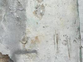 Concrete texture with an antique, scratched surface. photo