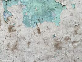 Grunge backdrop featuring an abstract paint pattern on concrete. photo