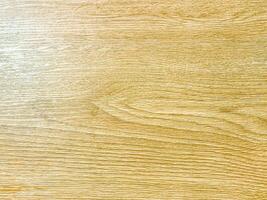 Teak wood with a rough and textured appearance, providing a raw and organic feel to designs. photo