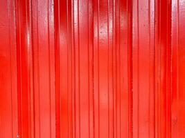 A beautiful red metal background, combining simplicity and elegance in design. photo