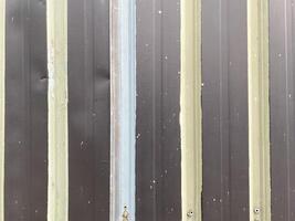 Dark concrete texture with a stucco finish on a white background. photo