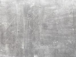 Grey and empty concrete wall, providing a neutral canvas for your creative endeavors. photo