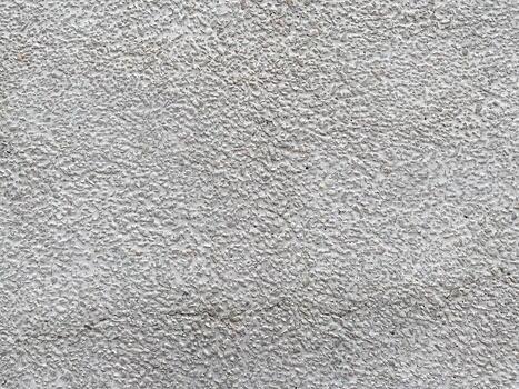 Concrete backdrop with a scratched and messy effect. photo