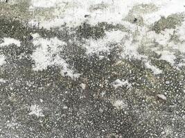 A closeup of an abstract concrete surface, perfect for creating eye-catching visuals. photo