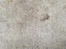 closeup of a beautiful grey concrete surface, suitable for creating stunning visuals with a modern touch. photo