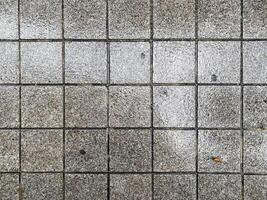 Vintage and isolated concrete floor with a blank gray pattern. photo