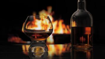 Glass and bottle of cognac, whiskey, scotch or bourbon stands on a table against background of a fireplace with a flame. Alcoholic drink and home comfort concept. video