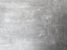 Grey and empty concrete wall, providing a neutral canvas for your creative endeavors. photo