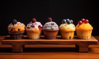 AI generated Mini muffins on a wooden board. Generated by artificial intelligence. photo