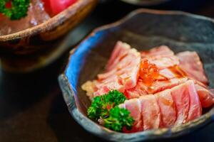 Grilled salmon sushi with salmon eggs on top, Premium Japanese food photo