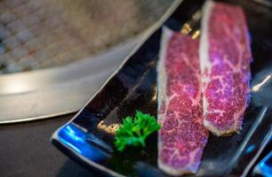 Cross Cut Short Ribs beef on  plate, Beef Short Ribs on dish, Premium Japanese meat photo