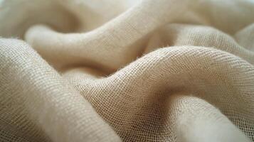 AI generated Detailed close-up of beige linen fabric with natural, organic texture and soft undulating folds, highlighting the material's weave. photo