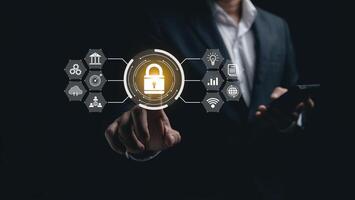 Businessman using mobile phone and laptop login to access, information security and encryption, secure access user's information, Internet access, cybersecurity. Cyber security technology concept. photo