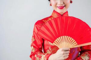 ai generado retrato fotografía. asiático chino mujer sonriente en tradicional cheongsam qipao vestir en blanco o gris antecedentes. chino nuevo año festival concepto. foto