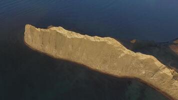 Aerial view on the beach of Sudak in Crimea, Black Sea coast. Shot. The Crimean coast from above. Beautiful Crimean landscape, black sea and mountain views video