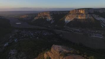 Aerial view on Mountain Landscape with sunset background, somewhere in United States. Shot video