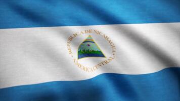 Nicaragua país bandera animación valores imágenes. bandera de Nicaragua ondulación en blanco antecedentes. Nicaragua país bandera animación ondulación en el brisa con algodón textura y en cerca arriba video