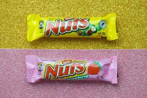 KYIV, UKRAINE - MAY 4, 2022 Nuts original chocolate bar manufactured by Nestle company photo