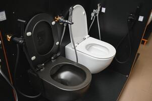 toilet bowls in the store photo