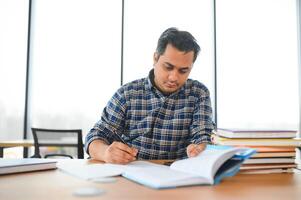 indian male student at the university photo