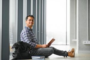 indian male student at the university photo