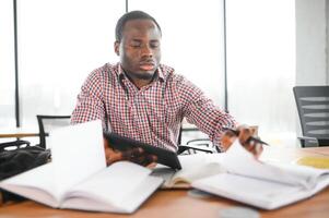 Portrait of african university student in class looking at camera photo